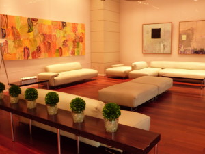 Sophisticated Condo/Hotel Lobby adorned with art & various conversations areas